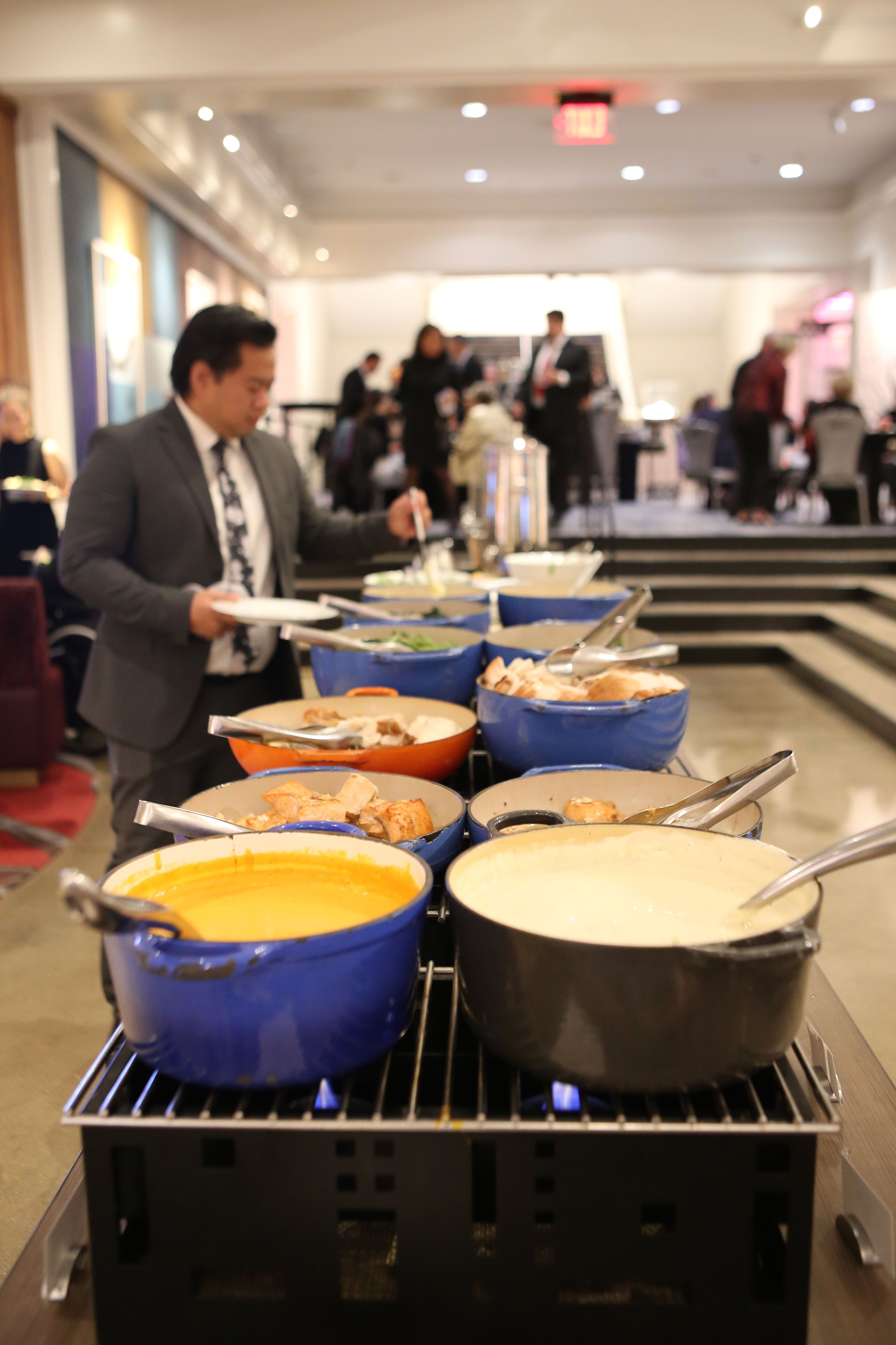 Attendee enjoys dinner buffet