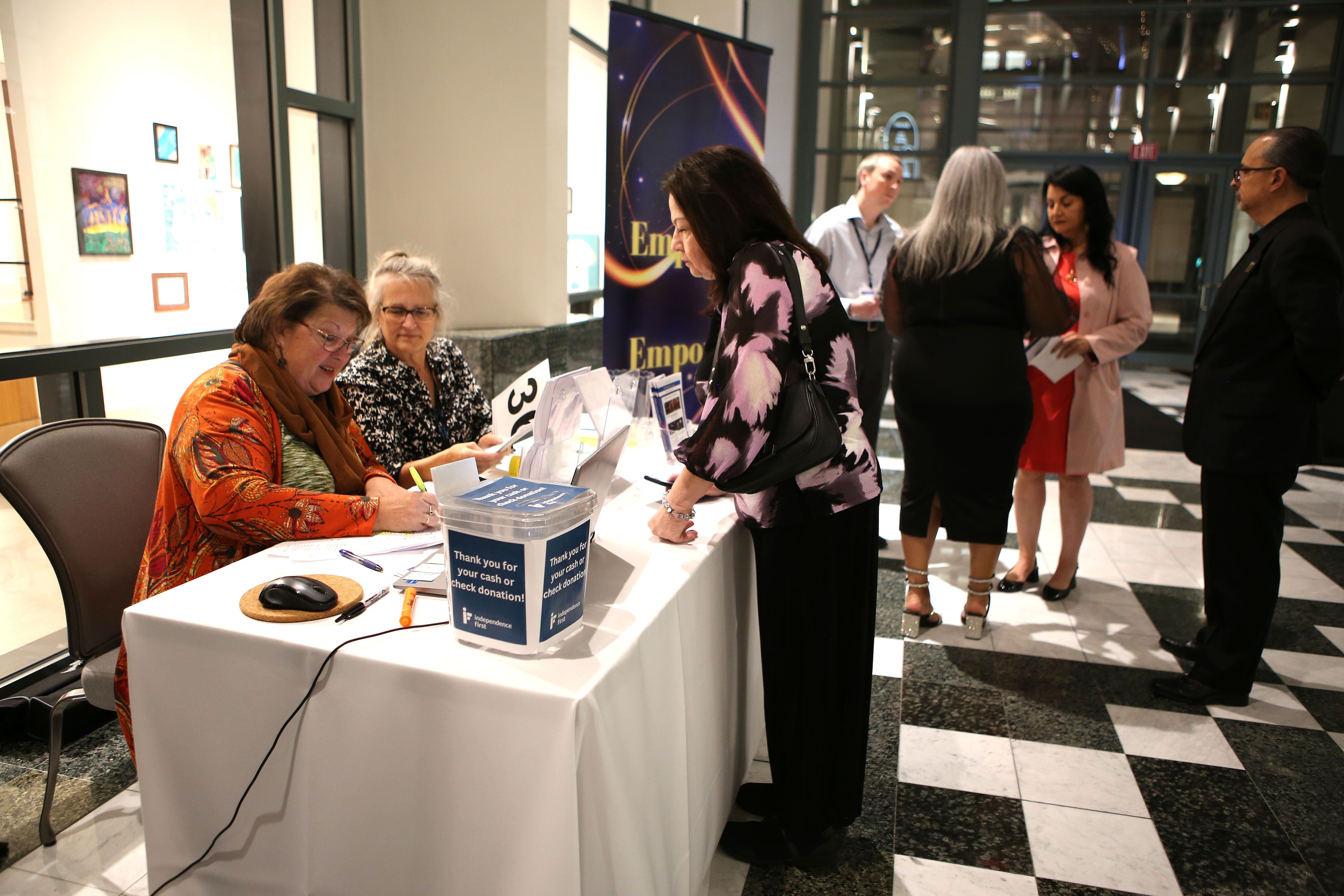 Guests check in at registration